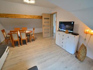 TV a/nebo společenská místnost v ubytování Holiday home 200 qm Kolobrzeg