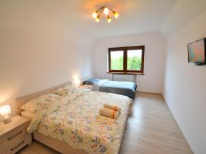 Postel nebo postele na pokoji v ubytování Holiday home 200 qm Kolobrzeg + 16 fotografií