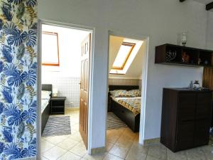 Voodi või voodid majutusasutuse Apartment in Rowy with a garden toas