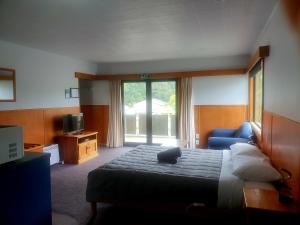 Postel nebo postele na pokoji v ubytování Geraldine Motels