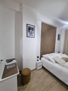 Ένα ή περισσότερα κρεβάτια σε δωμάτιο στο Niluna