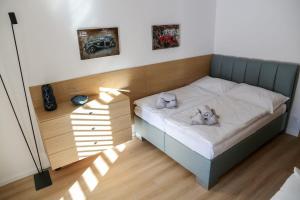 Postel nebo postele na pokoji v ubytování Apartmánový dům Karolinka + 14 fotografií
