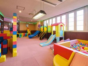 a childrens play room with colorful playground equipment at Ikaho no mori Kids Paradise in Ikaho