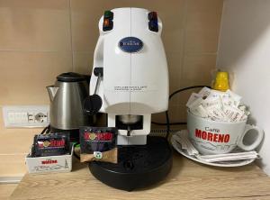 a coffee maker sitting on top of a counter at Casa Marisa Pozzuoli in Pozzuoli