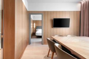 Postel nebo postele na pokoji v ubytování AC Hotel Diagonal L'Illa by Marriott