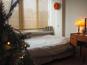 Ένα ή περισσότερα κρεβάτια σε δωμάτιο στο Mongle Home