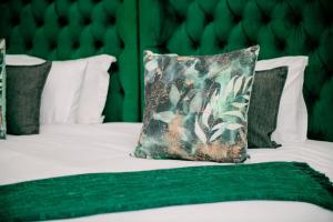 Ένα ή περισσότερα κρεβάτια σε δωμάτιο στο Elements Sunrise Bush Lodge