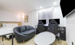 TV a/nebo společenská místnost v ubytování JECHEON No 25 HOTEL