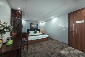 TV a/nebo společenská místnost v ubytování Central Sapa March Hotel