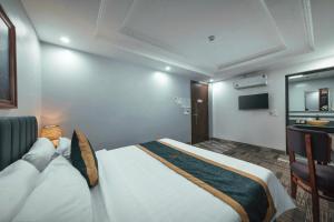 TV a/nebo společenská místnost v ubytování Central Sapa March Hotel