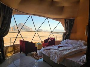 Postel nebo postele na pokoji v ubytování RUM VICTORIA lUXURY CAMP