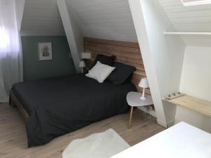 Ένα ή περισσότερα κρεβάτια σε δωμάτιο στο Maison Chiche 4 chambres indépendantes salon cuisine commune