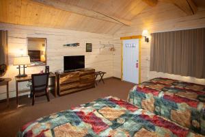 Postel nebo postele na pokoji v ubytování Young's Motel