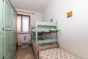 Posteľ alebo postele v izbe v ubytovaní Appartamento Primula