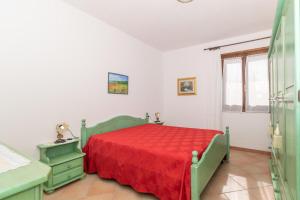 Posteľ alebo postele v izbe v ubytovaní Appartamento Primula