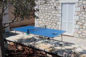 Stolní tenis v ubytování Villa Gionis nebo okolí