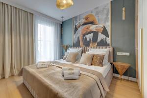 Posteľ alebo postele v izbe v ubytovaní Merwede Residence - 100 metrów od plaży by Downtown Apartments