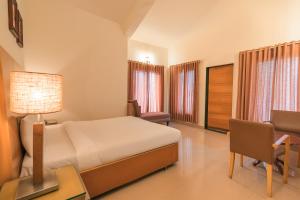 Postel nebo postele na pokoji v ubytování Villas By Hangout + 28 fotografií