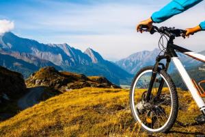 a person riding a bike on top of a mountain at Cottage in Vellies in Áyios Sarándos