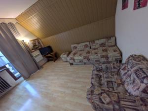 Łóżko lub łóżka w pokoju w obiekcie Apartament Rita