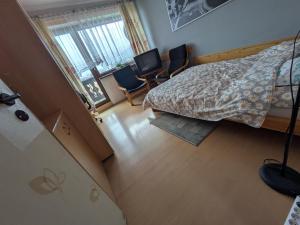 Łóżko lub łóżka w pokoju w obiekcie Apartament Rita
