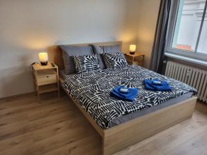 Postel nebo postele na pokoji v ubytování City Center Apartments - Moderna Brno Římské náměstí I