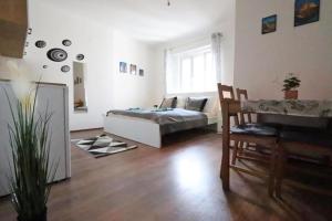 Postel nebo postele na pokoji v ubytování City Center Apartments - Moderna Brno Římské náměstí I