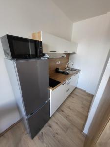 Kuchyň nebo kuchyňský kout v ubytování City Center Apartments - Moderna Brno Římské náměstí I