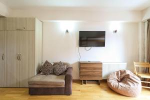 Posezení v ubytování Cozy Apartment In New Gudauri Redco