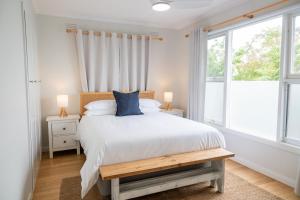 Ένα ή περισσότερα κρεβάτια σε δωμάτιο στο Metung Holiday House