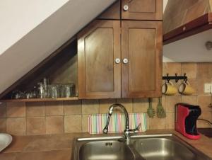 Cucina o angolo cottura di La Casetta degli Innamorati