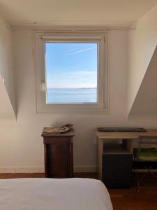 Postel nebo postele na pokoji v ubytování Maison avec vue exceptionnelle et grand jardin