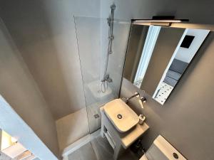 Kúpeľňa v ubytovaní Tinion Urban Hotel