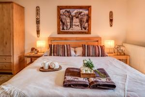Postel nebo postele na pokoji v ubytování Africa House