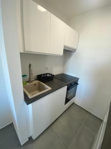 Kuchyň nebo kuchyňský kout v ubytování Casa Maslina - 2