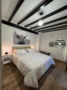 Postel nebo postele na pokoji v ubytování El gallinero de la villana