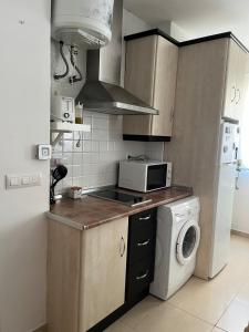 Η κουζίνα ή μικρή κουζίνα στο Estudio zona residencial +4 φωτογραφίες