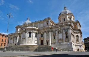 a large building with people standing in front of it at Hotel Farini in Rome