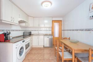 A kitchen or kitchenette at Herba Sana