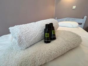 Posteľ alebo postele v izbe v ubytovaní Tinion Urban Hotel