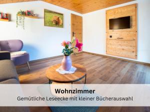 Μια τηλεόραση ή/και κέντρο ψυχαγωγίας στο Haus Angelika - Ferienwohnung Schrecksee