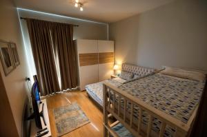 Ένα ή περισσότερα κρεβάτια σε δωμάτιο στο Two bedroom apartment at Mivida Boulevard +51 φωτογραφίες