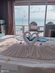 Charung by The Sea客房内的一张或多张床位