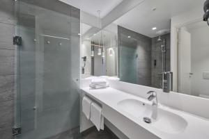 Koupelna v ubytování Four Points Flex by Sheraton Vejle + 28 fotografií