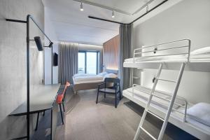 Un pat sau paturi într-o cameră la Four Points Flex by Sheraton Vejle