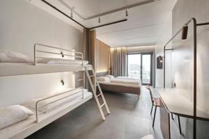 Un pat sau paturi într-o cameră la Four Points Flex by Sheraton Vejle