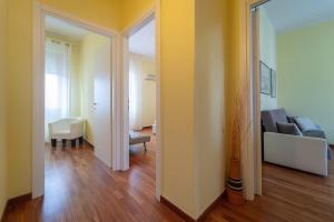 A bed or beds in a room at Apartments via Spano