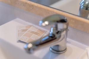 A bathroom at Apartments via Spano