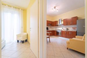 A kitchen or kitchenette at Apartments via Spano
