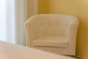 A seating area at Apartments via Spano